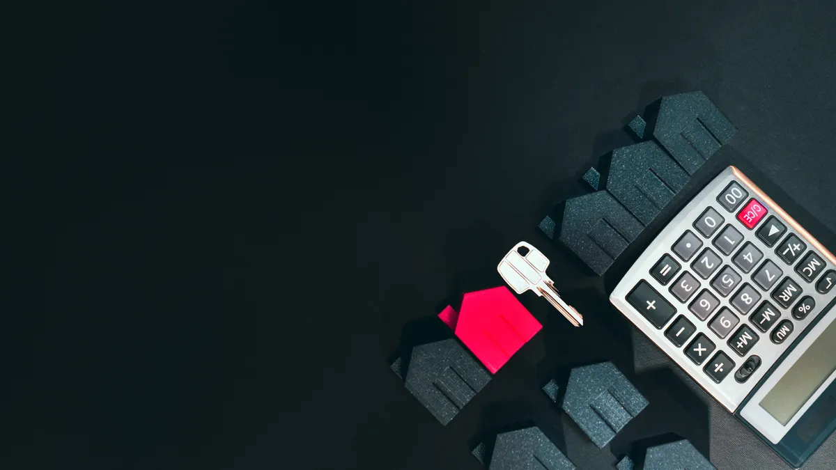How to compare fixed-payment and interest-only loan offers Calculator beside house blocks and a key