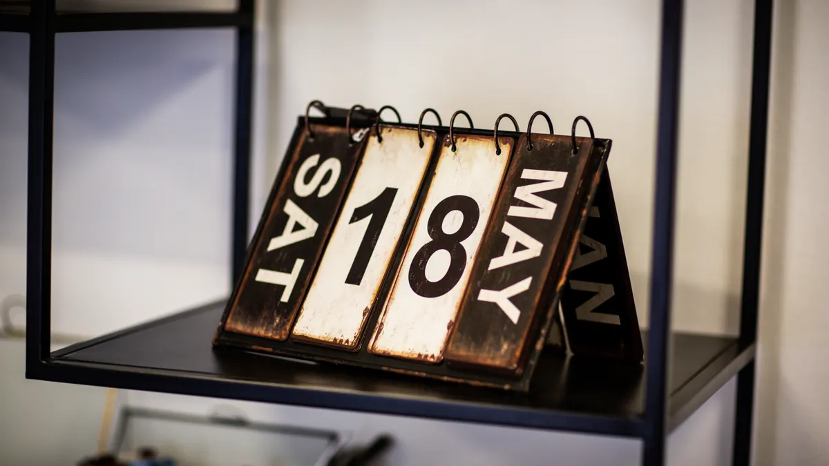 Loan comparison checklist for rate locks and rate hold periods flip desk calendar showing dates